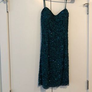 Strapless, turquoise, sequin homecoming dress.